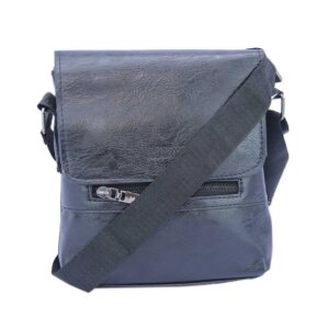 Textured shoulder bag with flap closure and front zip pocket.