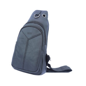 Textured sling bag with zip compartments and metal ring detail.