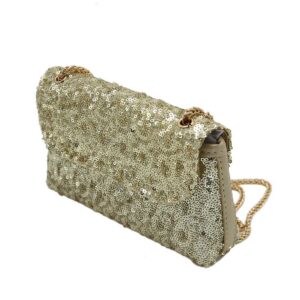 Purse covered in silver sequins with a flap closure