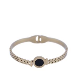 Bracelet with a geometric cutout design and a central stone.