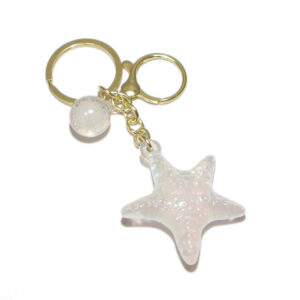 Decorative multi-charm keyring.