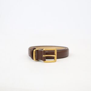 Classic womens belt with smooth finish and gold-tone buckle for everyday styling.