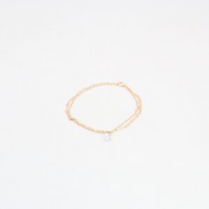 Layered chain anklet with crystal pendant detail