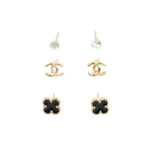 Gold clover and logo style stud earrings set with crystal detail