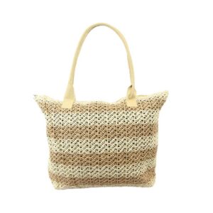 Woven beach bag with braided handles and tassel charm, ideal for summer outings.