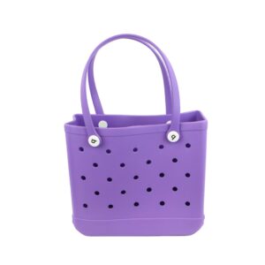 Beach tote bag with perforated design and structured base for easy carry.