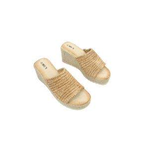 Woven strap wedge sandals with open toe design and textured upper.
