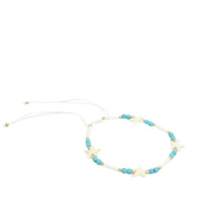 Sea-inspired anklet with starfish charms and decorative bead detailing.