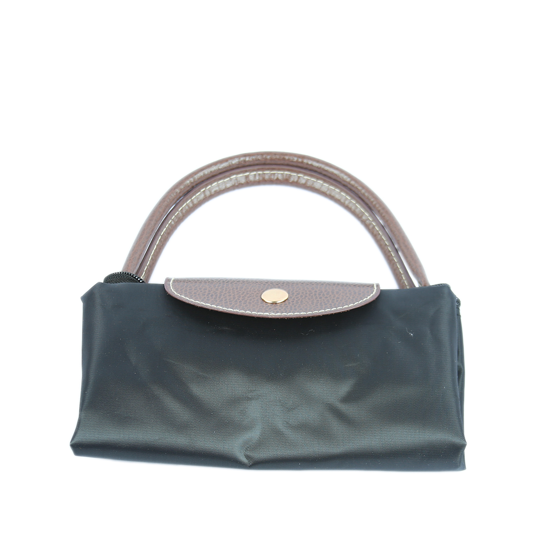 Fabric handbag with brown leather flap and handles