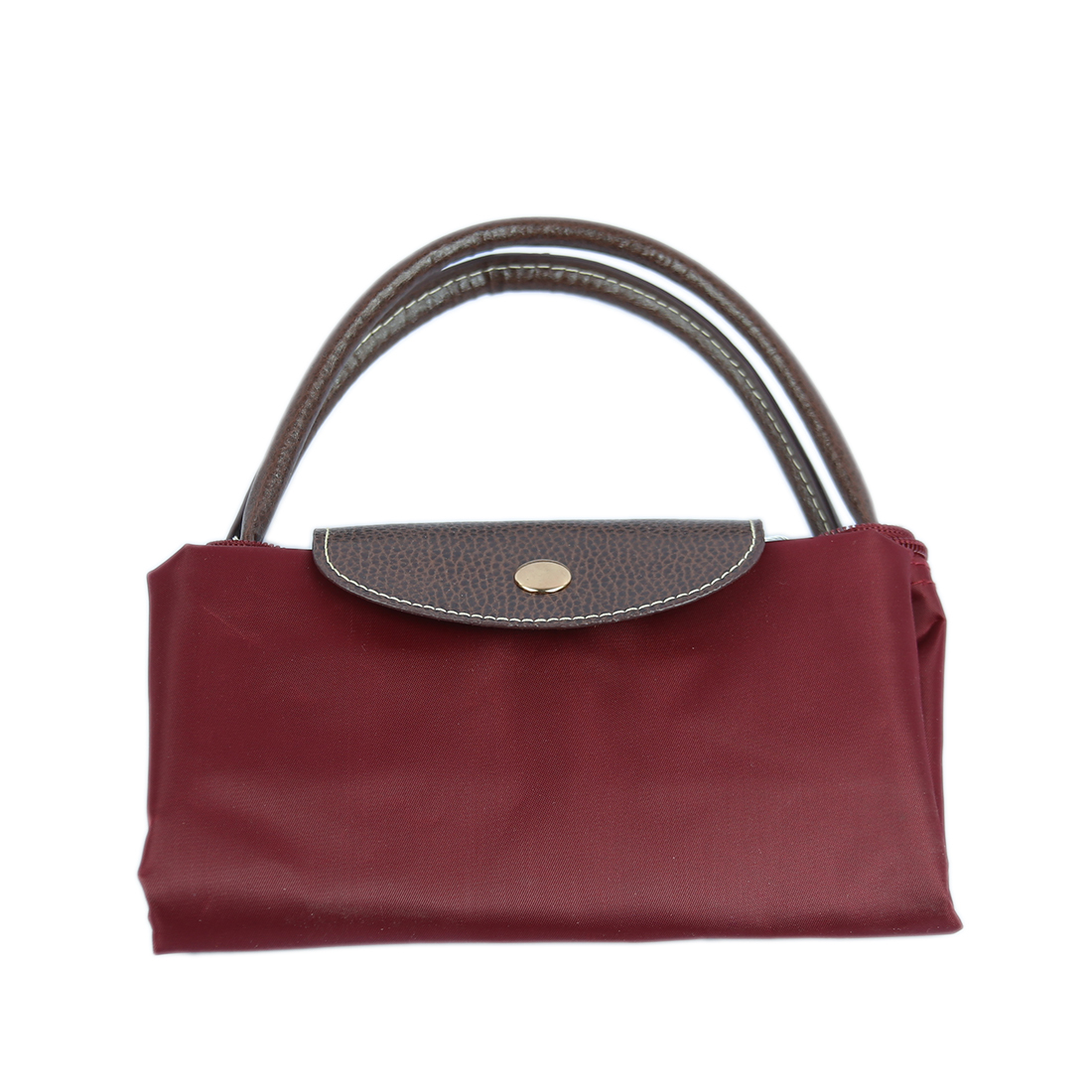 Fabric handbag with brown leather flap and handles
