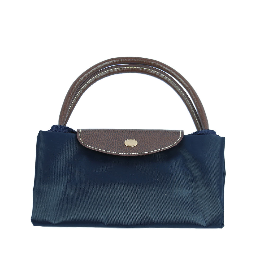 Fabric handbag with brown leather flap and handles