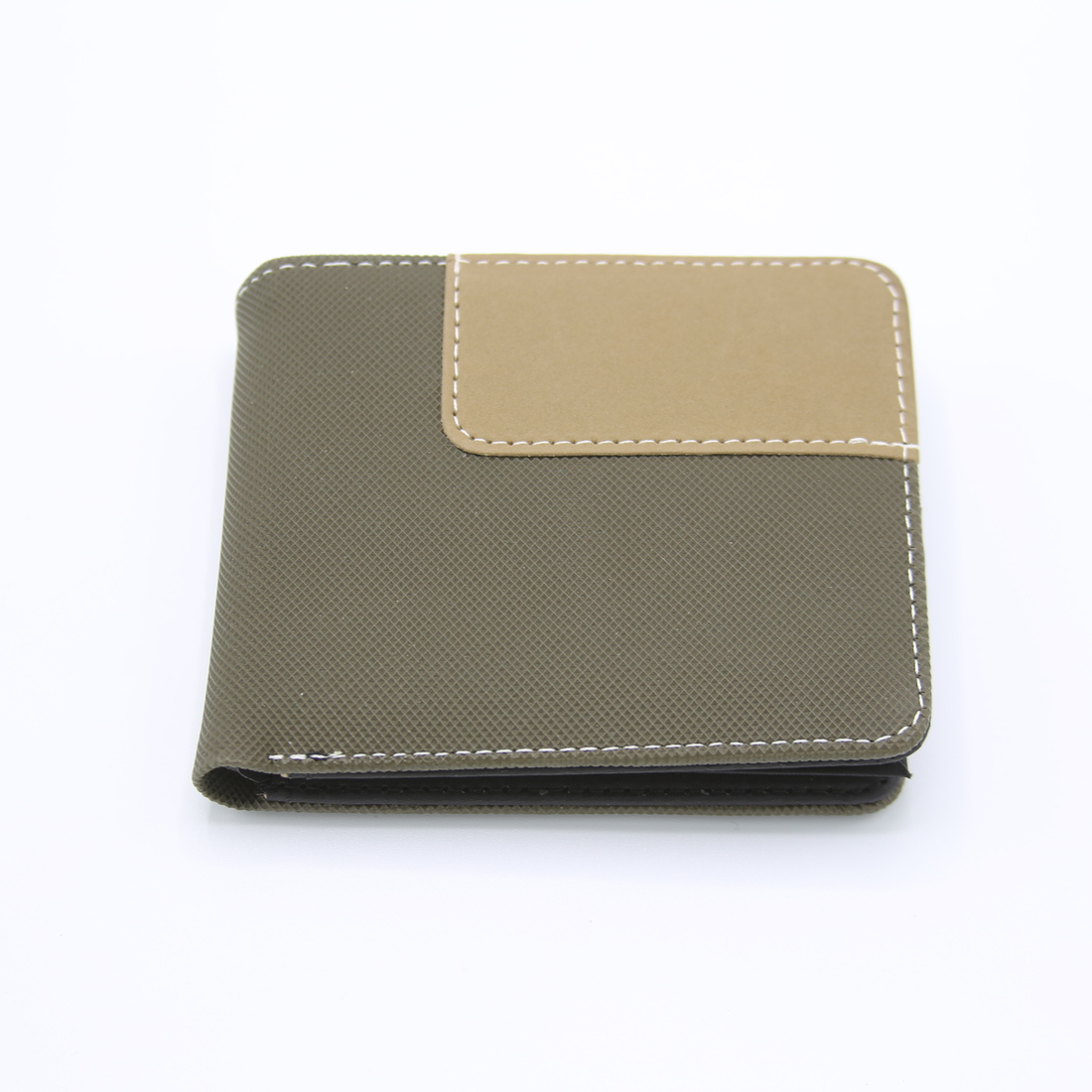 Men’s wallet with textured design and contrast detail.