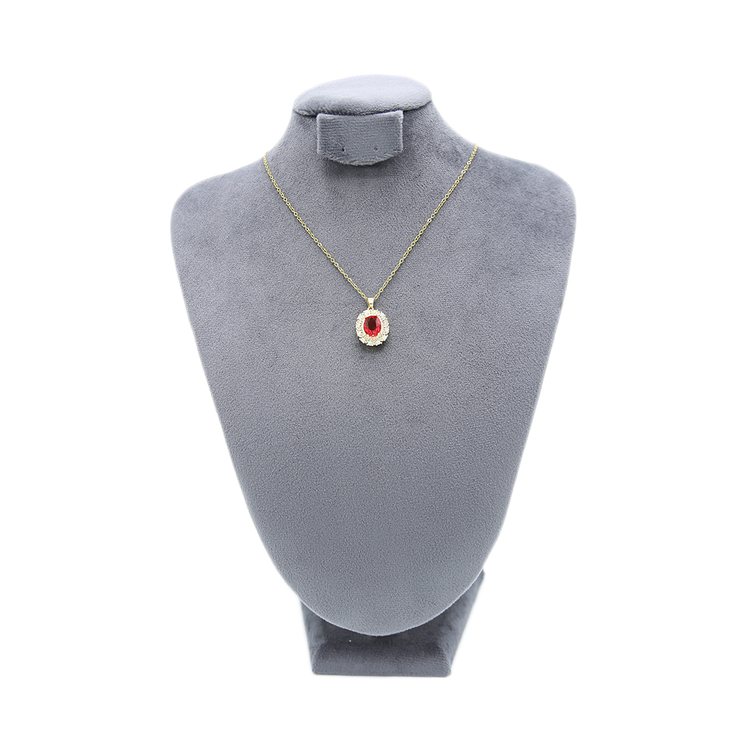 Gold-toned necklace with red gemstone pendant