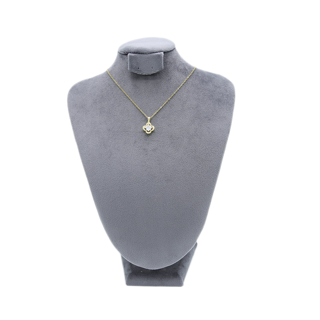 necklace with a clear gemstone pendant.