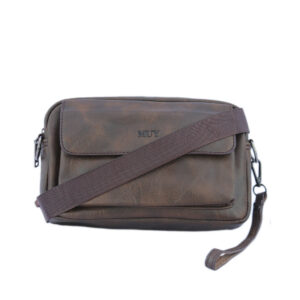 Textured crossbody bag with front flap pocket and logo detail.