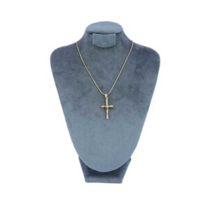 Gold-toned chain necklace with a cross pendant.