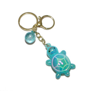 Decorative multi-charm keyring.