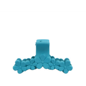 Floral bar hair claw with layered flower detailing and secure grip design.