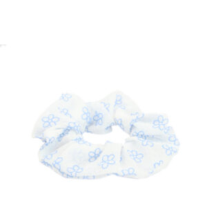 Printed fabric scrunchie with elastic hold for everyday styling.