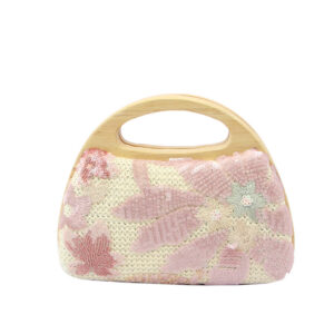Floral embellished clutch bag with sequin detailing and wooden handle for standout styling.