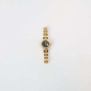 Classic round dial wrist watch with stone detail bezel and metal link strap for everyday wear.