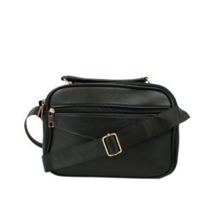 Crossbody bag with structured compact design, front zip pocket and adjustable strap for everyday use.