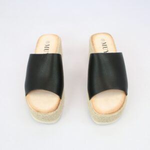 Wide strap wedge slide sandals with open toe design.