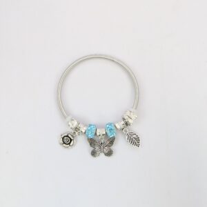 Silver charm bracelet with blue beads