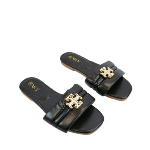 Padded strap with metal detail and a comfy flat footbed sandal