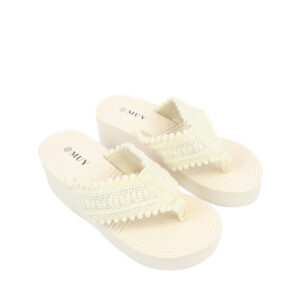 Knotted strap detail with a soft textured flat footbed sandal