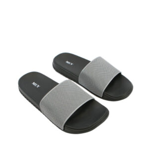 Mens slide sandals with wide textured strap and cushioned sole for casual everyday wear.