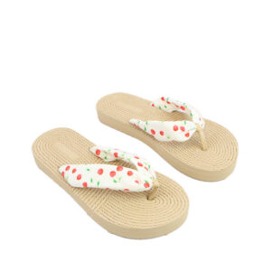 Flat sandals with rope-textured sole and fabric bow strap detail.
