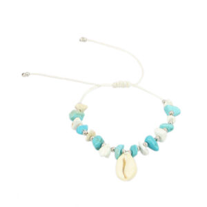 Sea-inspired anklet with starfish charms and decorative bead detailing.