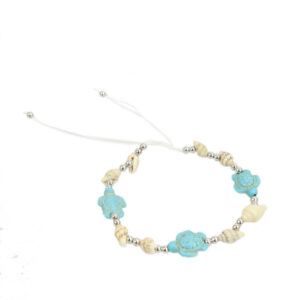 Sea-inspired anklet with starfish charms and decorative bead detailing.
