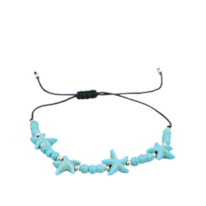 Sea-inspired bracelet with mixed charms and bead detailing on an adjustable cord.
